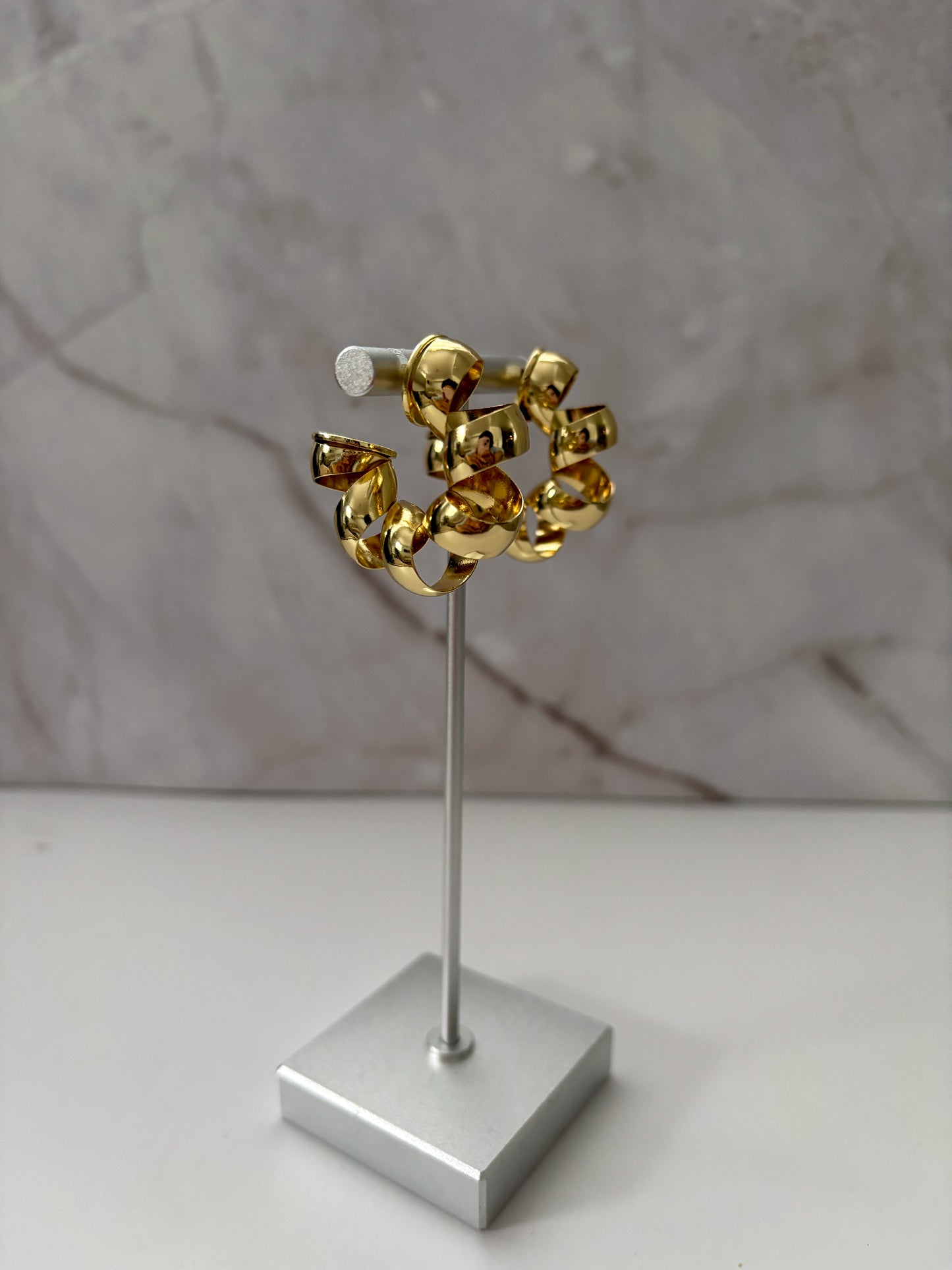 Torque earrings